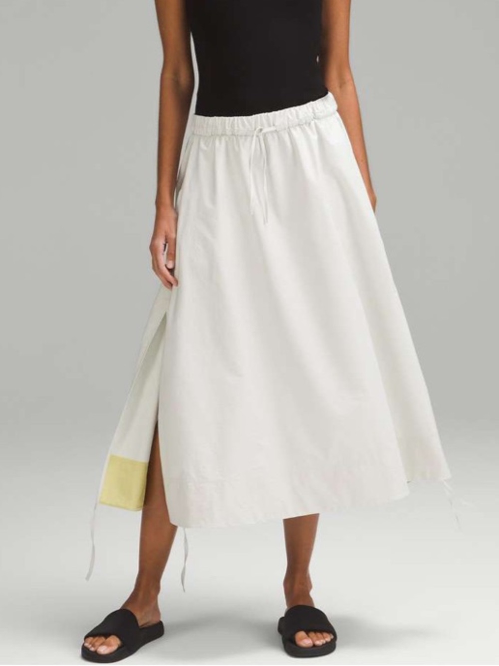 62. Size Large LULULEMON Ivory High Rise Side Slit Skirt - Picture 6 of 8